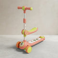 2-in-1 kids scooter with seat in coral and lime green, front angle view