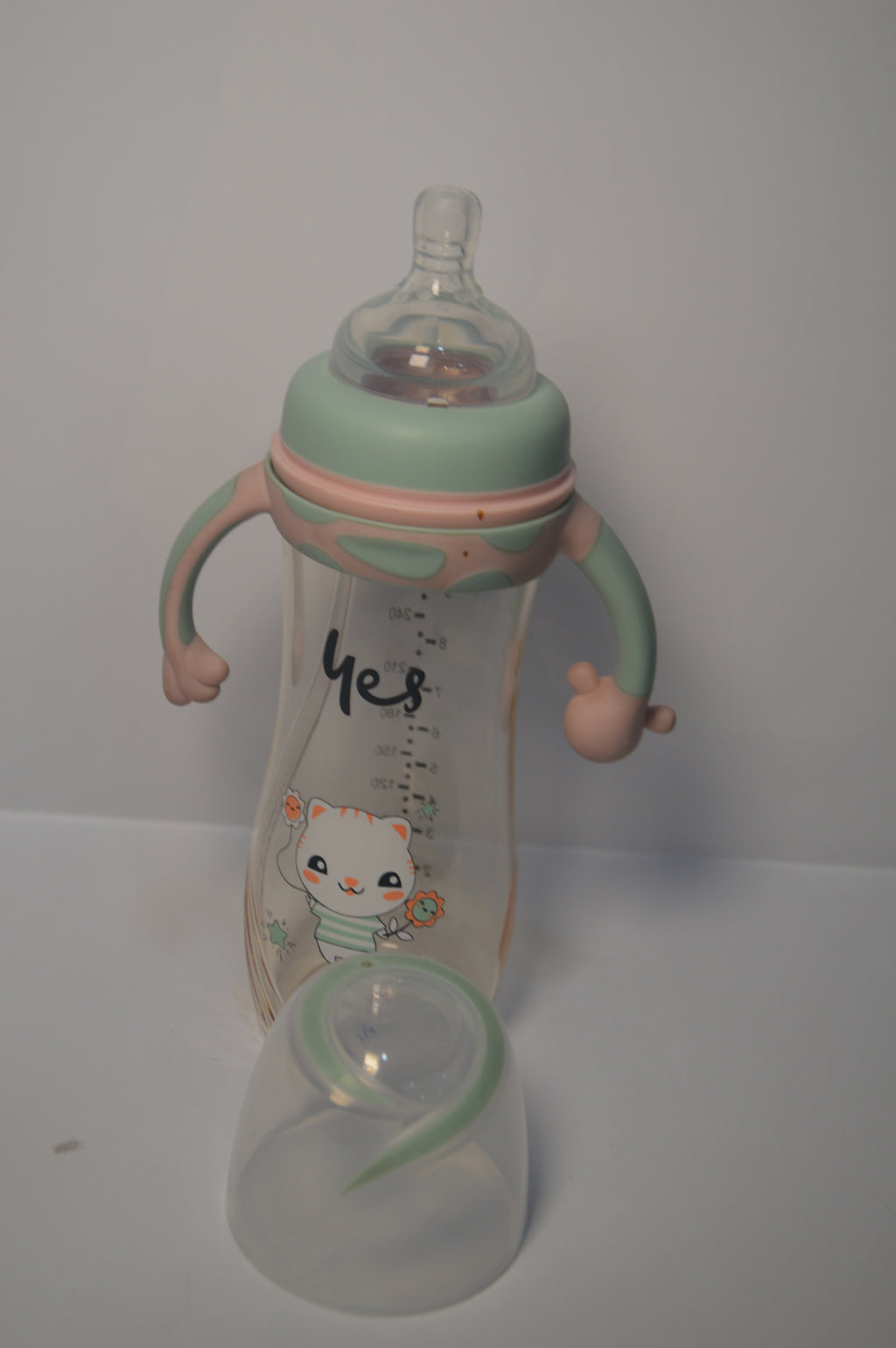 Cute Kitty Anti-Colic Baby Feeding Bottle with Comfort Trainer Handles (Mint Green &amp; Pink, 300ml)