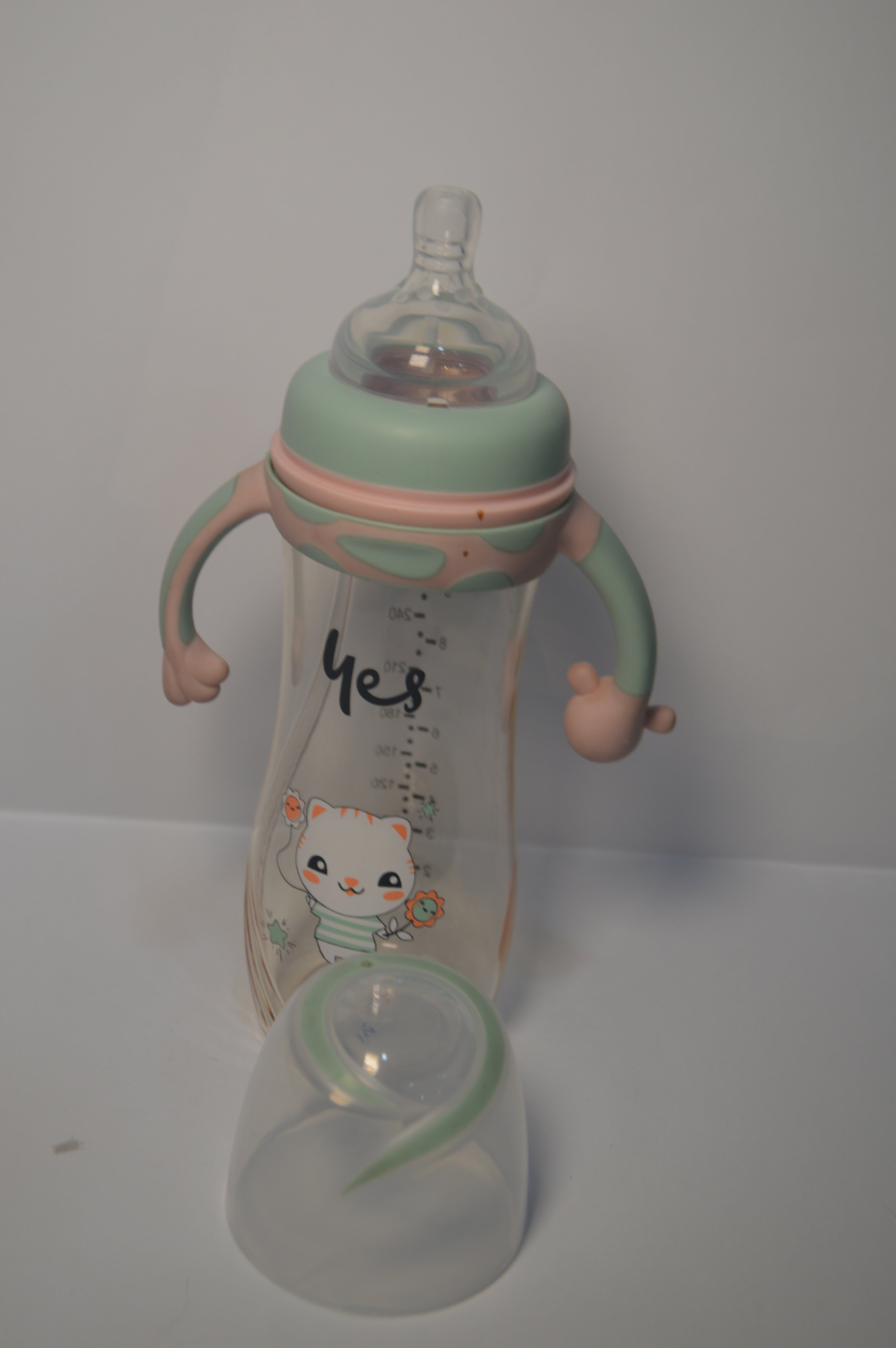Cute Kitty Anti-Colic Baby Feeding Bottle with Comfort Trainer Handles (Mint Green &amp; Pink, 300ml)