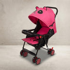 Angled view of pink baby stroller with feeding tray and cup holder