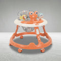 Angled view of orange baby walker with 8 wheels and toy tray
