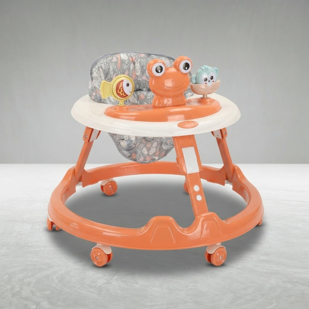 Angled view of orange baby walker with 8 wheels and toy tray