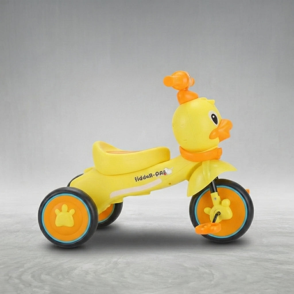 Side view of duck tricycle with padded seat and pedals