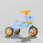 Side view of elephant tricycle with padded seat and pedals