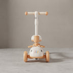 Front view of kids scooter with bunny face and pastel wheels