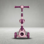 Pink and purple 2-in-1 kids scooter with seat and front toy feature, front view
