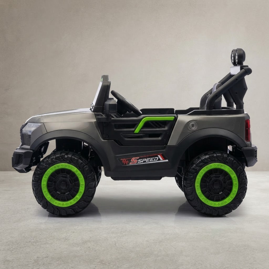 Side view of grey off-road ride-on jeep with green wheels
