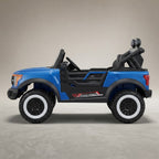 Side view of blue off-road ride-on truck with rugged tires
