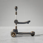 Side view of sporty racing-style kids scooter with seat