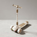 Angled view of premium kids scooter with LED lights on deck