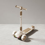 Angled view of premium kids scooter with LED lights on deck